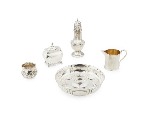 A collection of silver including tea caster etc.to include: a Tudor inspired low comport, Goldsmiths, London 1923, of lobed p