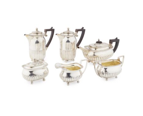 An early 20th century six piece tea setLambert &amp; Co, London 1912, comprising teapot, two waterpots, twin handled sugar bo