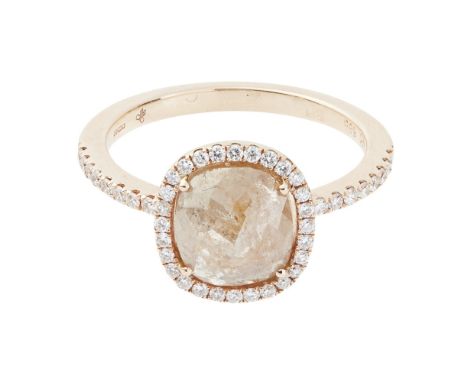 A diamond set cluster ringcollet set with a modern rose-cut diamond in a border of small round-brilliant cut diamonds, the sh
