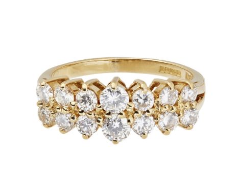 A diamond set cluster ringclaw set with two rows of seven graduated round-brilliant cut diamonds, to an 18ct yellow gold shan