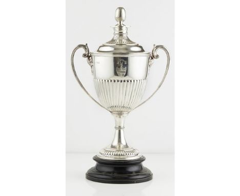 An impressive Victorian twin handled trophy with coverpossibly Charles Boyton, London 1899, of vase form, demi-fluted body le