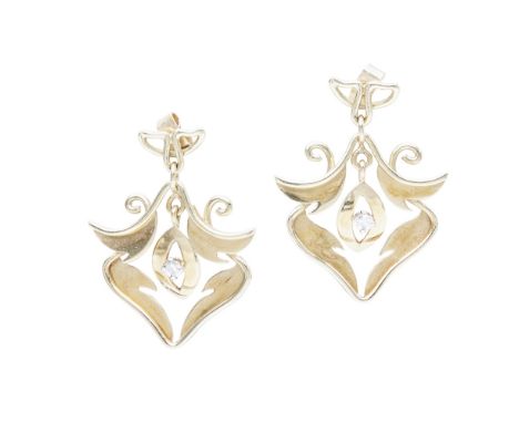 A pair of bespoke 18ct gold diamond set earrings, Margot Gardinereach of tapered scrolling design with a central diamond set 