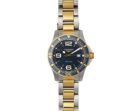 A gentleman's two tone wrist watch, LonginesHydro Conquest, metallic blue dial, sweep second hand, bold white Arabic numerals