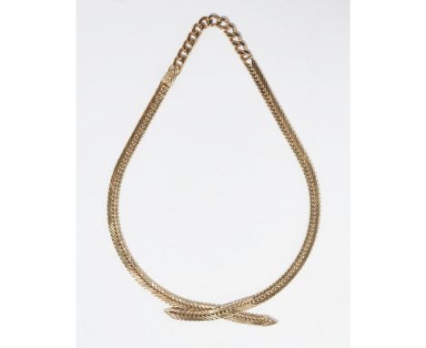 A 9ct gold necklacecomposed of tapering flattened fancy links, fold-over clasp, modelled as a crossover tieLength: 54cm, 57g