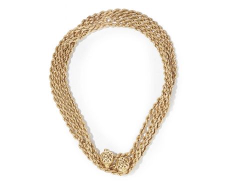 A 9ct gold chaincomposed of a single strand of rope-twist links, with two pierced globular spacers, stamped 14kLength: 150cm,
