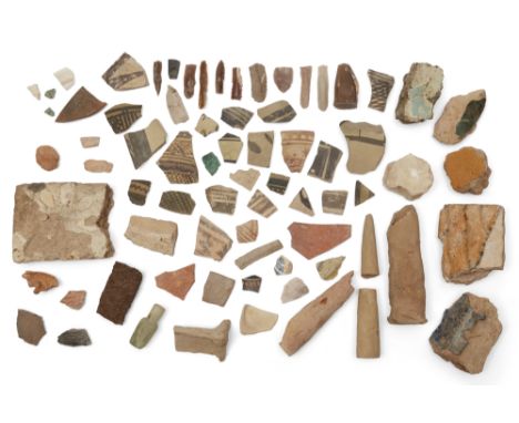 A miscellaneous group of artefacts and fragments, including Palaeolithic flint cores and flakes, 6.5 cm max length;  a collec