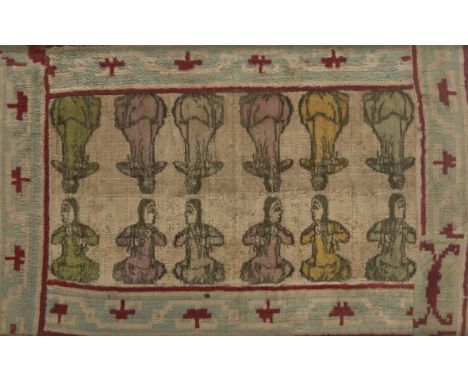 A silk embroidered velvet panel, Persia, 19th century, with two rows of seated pairs of women in pink, yellow and green withi