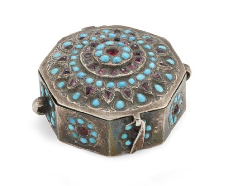 A Qajar turquoise, garnet and glass inlaid silver talismanic bazuband, Iran, 19th century, of octagonal form, with hinged lid