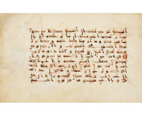 A Qur'an bifolium, North Africa, 9th-10th century, Arabic manuscript on vellum, with 11 lines to the page written in dark bro