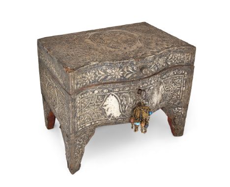 A silver marriage casket, Ottoman Egypt, 19th century, on four bracket feet, of wood covered in silver embossed with martial 