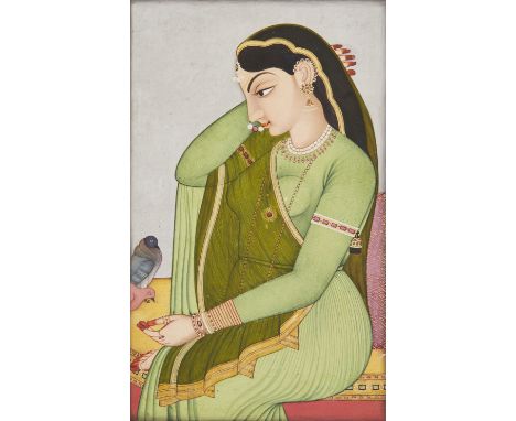 A portrait of a courtesan feeding birds, Kangra or Guler, North India, late 19th century, opaque pigments on paper heightened