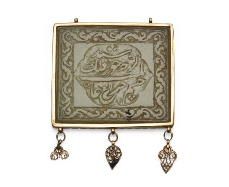 A Group of Important Works - To be sold Without ReserveA Qajar inscribed jade pendant with gold mount, Persia, 19th century, 