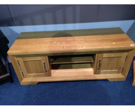 A light oak TV stand