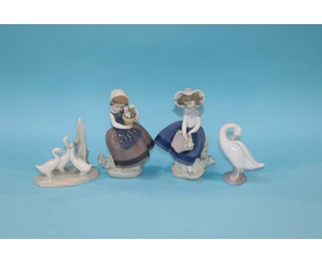 Two Lladro figures, a duck and a Nao duck