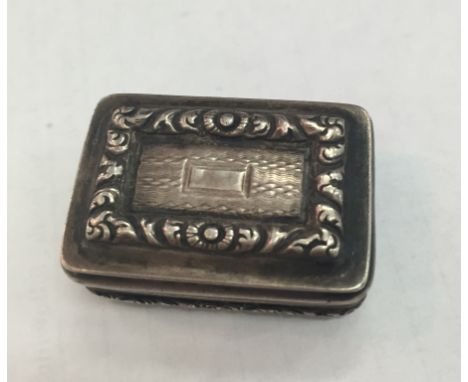A George IV silver vinaigrette with gilded interior and pierced floral grill, Birmingham 1826 by Joseph Willmore