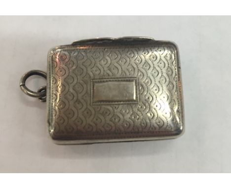 A George IV silver vinaigrette, Birmingham 1832, maker's mark 'TS': gilt floral pierced grill (unattached) and engraved prick