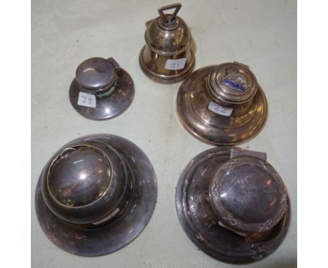 A HM silver inkwell in the form of a bell (Birmingham 1908); together with four HM silver capstan inkwells (5)