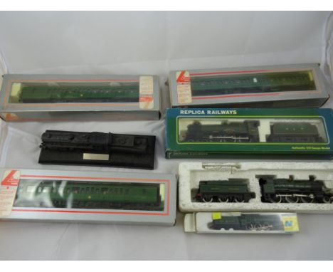 A quantity of 00 gauge trains/carriages; together with a Grafar N gauge engine