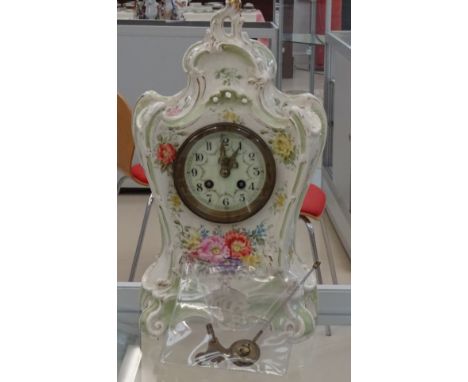A Royal Bonn rococo-style porcelain mantel clock
