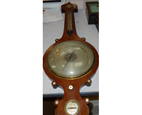 An edwardian mahogany banjo barometer