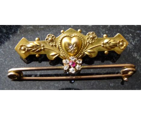A Victorian 9ct diamond and ruby bar brooch; together with a 15ct diamond set bar brooch