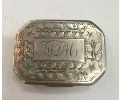 A George III large silver vinaigrette with floral engraving and monogrammed cartouche: gilt interior with rare swan grill: Bi