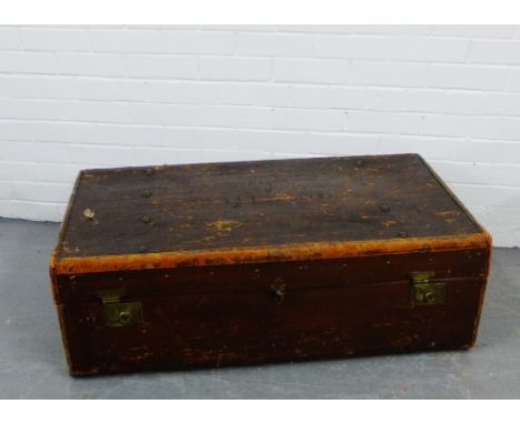 An early 20th century brass mounted  travel trunk