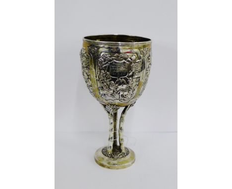 Chinese Export silver goblet, the bowl with decorative embossed panels of flowers, dragon, bamboo and figures on horseback, a