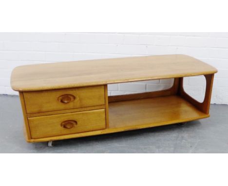 An Ercol light elm Windsor coffee table / cabinet with two short drawers and open recess,  40 x 124cm 