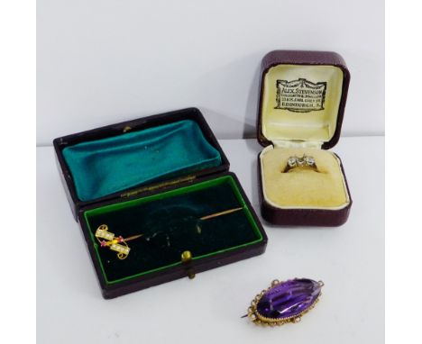 15 carat gold seed pearl and ruby tiepin, 9 carat gold framed brooch and a diamond ring with one stone lacking (3) 