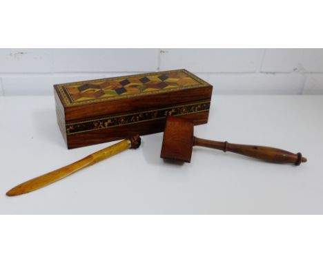 A Tunbridge ware box with hinged lid, 25cm long, together with a wooden mallet and a paper knife with bulls head dog finial, 