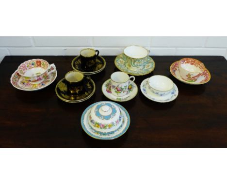 A collection of 19th century and later porcelain cups and saucers to include Booth's, Staffordshire and Swansea etc., (a lot)