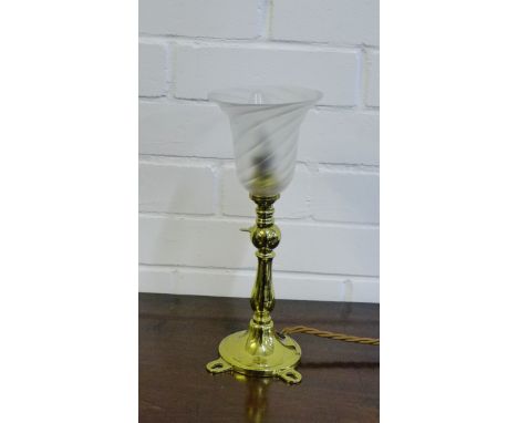 A brass Pullman lamp with an opaque glass shade