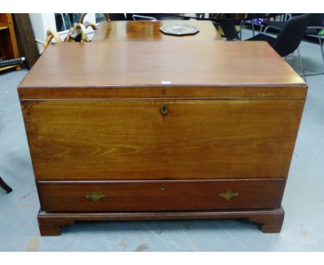 A 19th century mahogany linen trunk with brass handles to sides and raised on bracket plinth base 