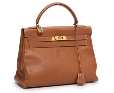 Handtasche "Kelly Bag",Hermès wohl Ende 20. Jh. Genarbtes Leder "Togo Gold", goldfarbene Metall-Elemente. Typ. Form m. 1 Henk