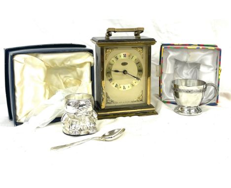 Metamec carriage clock, cased egg and spoon set and a cased christening mug 