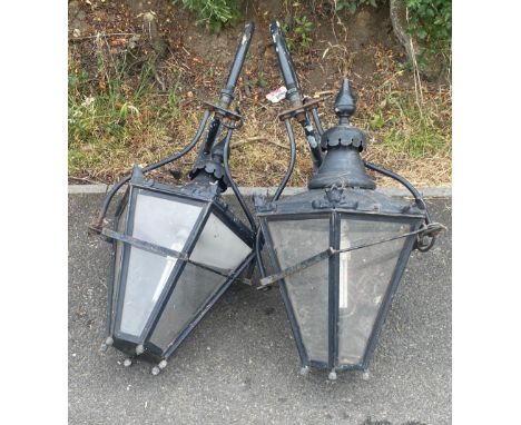 Pair of wall hanging vintage lanterns, with brackets, approximate height of lantern: 27 inches 