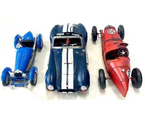Vintage Bugatti metal model cars, to include a AC Cobra 