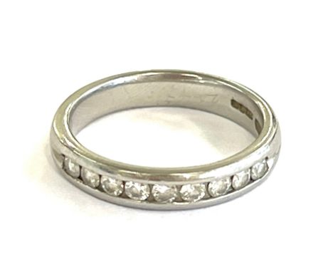 Ladies hallmarked platinum and diamond eternity ring, ring size M&nbsp; , approximate weight 5.7g