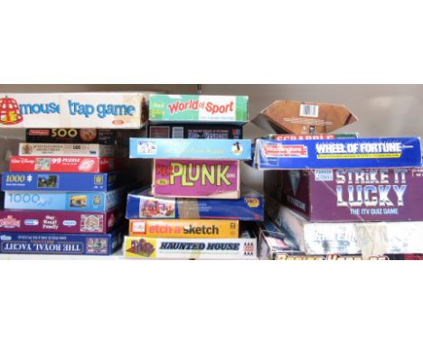 Games and puzzles, including Ideal Mousetrap, Parker Strike it Lucky, Tyco Racing Racing Hoppers, Dennis Fisher Haunted House