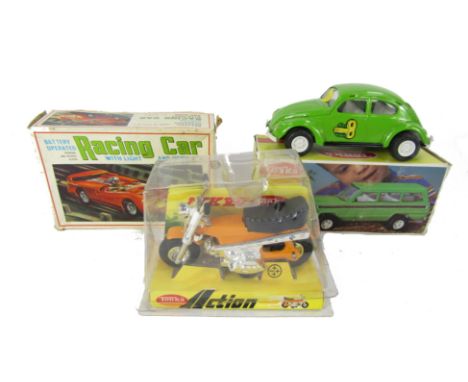 A Tonka Mini Tonka 1075 truck, Tonka Action bike, and a Marx Toys clockwork racing car, boxed. (3) 