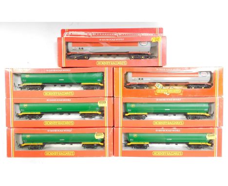 Hornby OO gauge rolling stock, including R028 Esso 100 tonne tank wagon, R007 BP 100 tonne tank wagon TEA, boxed. (7) 