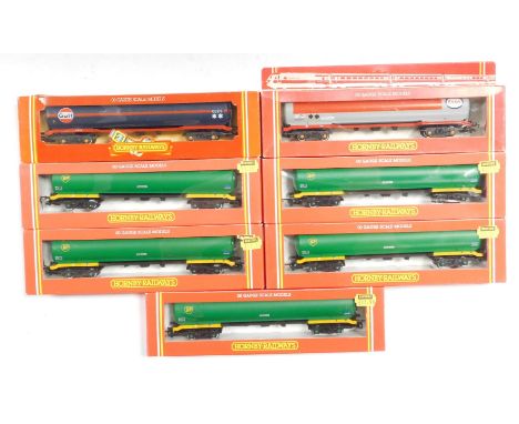 Hornby OO gauge rolling stock, including R007 BP 100 tonne tank wagon TEA, R028 Esso 100 tonne tank wagon, and R236 Gulf 100 
