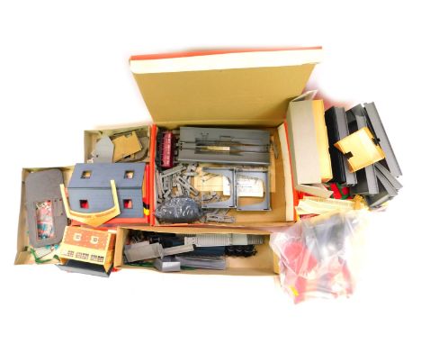 A quantity of Hornby OO gauge buildings, etc., to include signal box, R193 village shop, engine shed, mainline station, etc. 