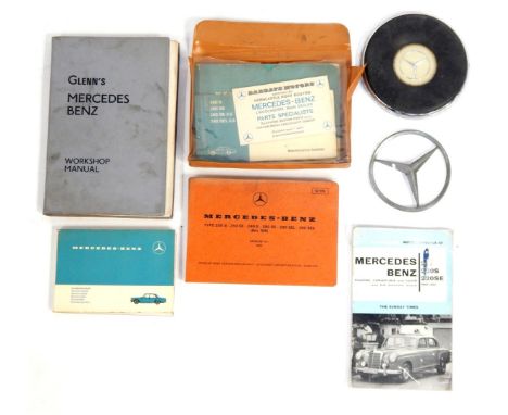 A steering wheel boss, together with Mercedes mascot, 220 Motor Manual 1956-60, Glenn's Mercedes Benz Workshop Manual, a Merc