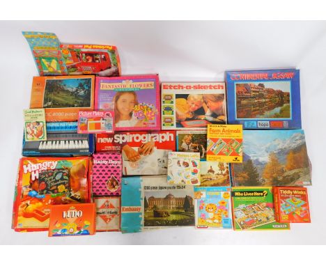 Games and puzzles, including John Waddington Monopoly, Etch A Sketch, Ludo, Spirograph, etc. (a quantity)  