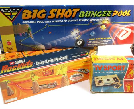 Toys and games, including Corgi Rocket Grand Canyon Speed Circuit, number 2075, TV Sport games console, and Aviva Sports Big 