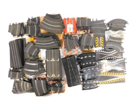 Scalextric track and accessories, including crossovers, corners, straights, etc. (a quantity) 