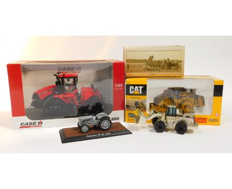 A case IH quadratrac 600 diecast tractor by Universal Hobbies, a CAT 825H soil compactor by Norscot Scale Models, etc. (4) 