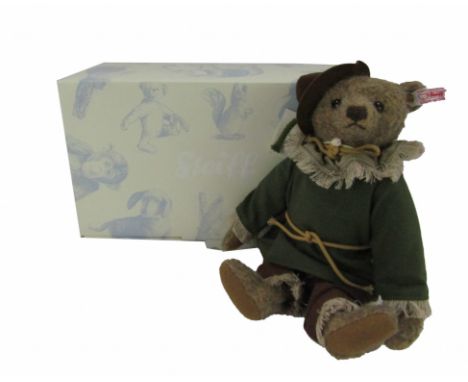 A Steiff Scarecrow The Wizard of Oz bear, for 2014, limited edition number 493/1939, with label, tag and box, 25cm high. 